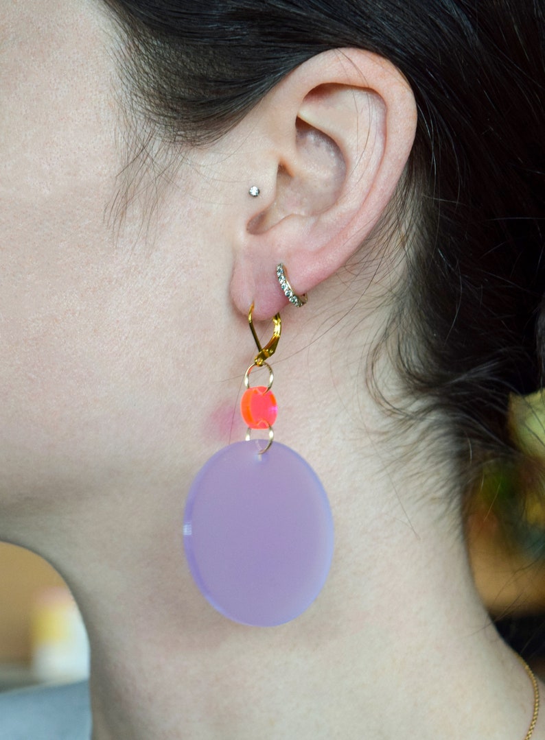 Neon pink and wisteria purple translucent acrylic circles