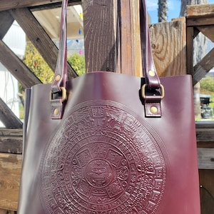 100% leather Aztec Calendar/calendaring Azteca tooled purse/yote