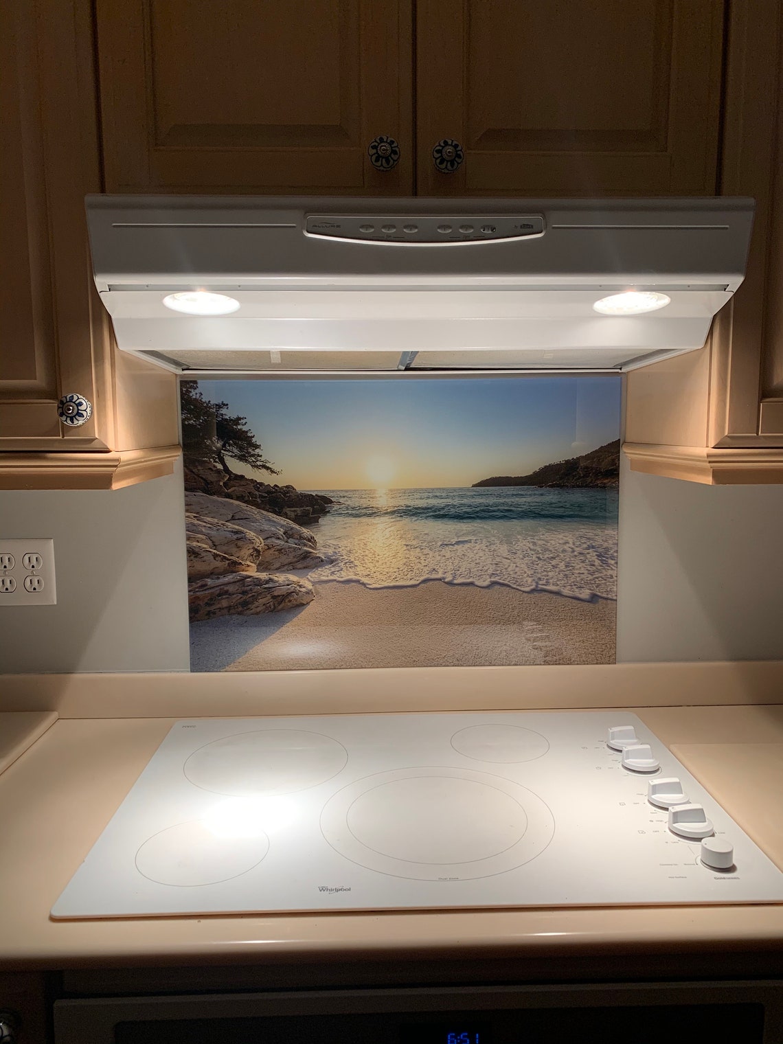 tempered glass behind stove
