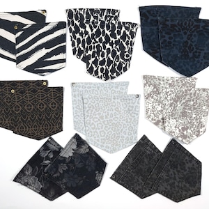 May include: Assortment of nine fabric pockets with various patterns, including zebra stripes, leopard print, geometric designs, and floral patterns. The pockets are all made of a soft, durable fabric and are perfect for adding a touch of personality to any project.
