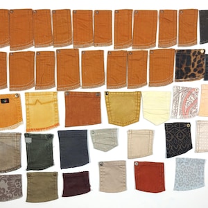 May include: A collection of fabric swatches in various colours and patterns, including denim, corduroy, and paisley. The swatches are arranged in rows and columns on a white background.
