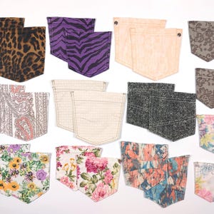 Può includere: Assortimento di 15 tasche in tessuto con vari motivi e colori, tra cui stampa leopardata, paisley, floreale, pois e denim. Le tasche sono tutte più o meno della stessa dimensione e forma.