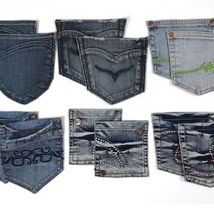 Könnte beinhalten: Sechs Paar Jeans-Taschen aus Denim mit verschiedenen Stickereien. Die Taschen sind in zwei Reihen mit jeweils drei Taschen angeordnet. Die Taschen sind alle in verschiedenen Blautönen.