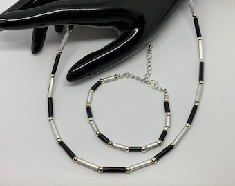 Filigrane Halskette aus Kaffeekapseln schwarz und Silber und passendes Armband