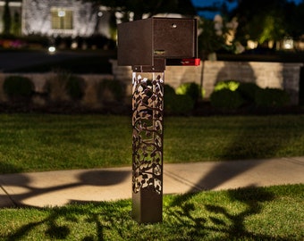 Custom Security Mailbox - Lights Up At Night! Choose from many different custom mailbox bollard posts that create beautiful light shadows.