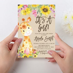 May include: A baby shower invitation with a cute cartoon giraffe illustration. The invitation is decorated with sunflowers and other flowers. The text on the invitation reads "It's a Girl!" and includes the name "Angela Smith", the date and time of the shower, and the location.