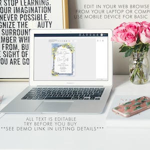 May include: A laptop displays a bridal shower invitation with floral and blue tile design. The screen is surrounded by a bouquet of pink roses in a glass jar, a phone with a cactus case, and a framed inspirational quote.