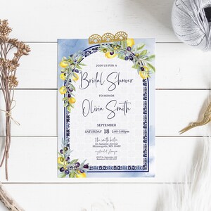 May include: A bridal shower invitation with a watercolor blue background and a decorative border. The invitation features a floral design with lemons and olives, and the text "Join us for a Bridal Shower to Honor Olivia Smith".