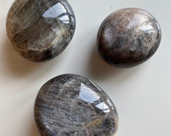Black moonstone palm stones