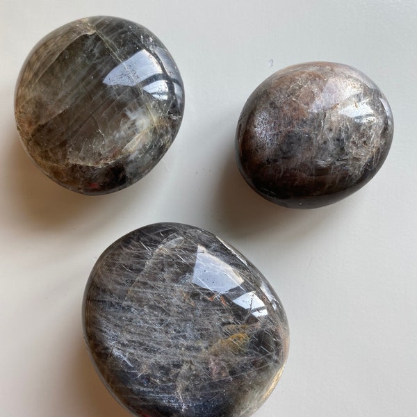 Black moonstone palm stones