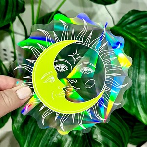 Magical Sun Catcher Window Sticker Featuring Beautiful g a Moon Within The Sun, Casting Beautiful Rainbow Reflections Into Your Home