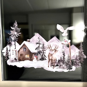 Magical Christmas Window Sticker – Cozy Village Scene with Reindeer, Owl & Snowman Against Majestic Mountains – Perfect Holiday Decoration!
