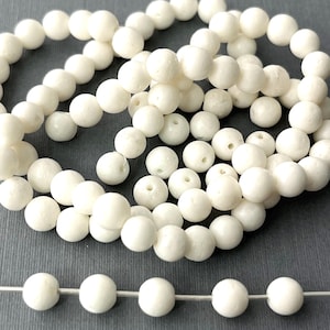Natural White Coral Round Bead 6mm, 72pcs. Elegant Gemstone in Soft White, Perfect for Unique Jewelry Creations.