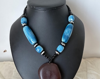Blue beaded necklace with an Entada seed bead | African handcrafted jewelry | Gift for women