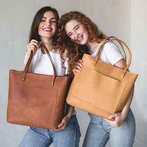 Genuine leather tote bag with outside pocket