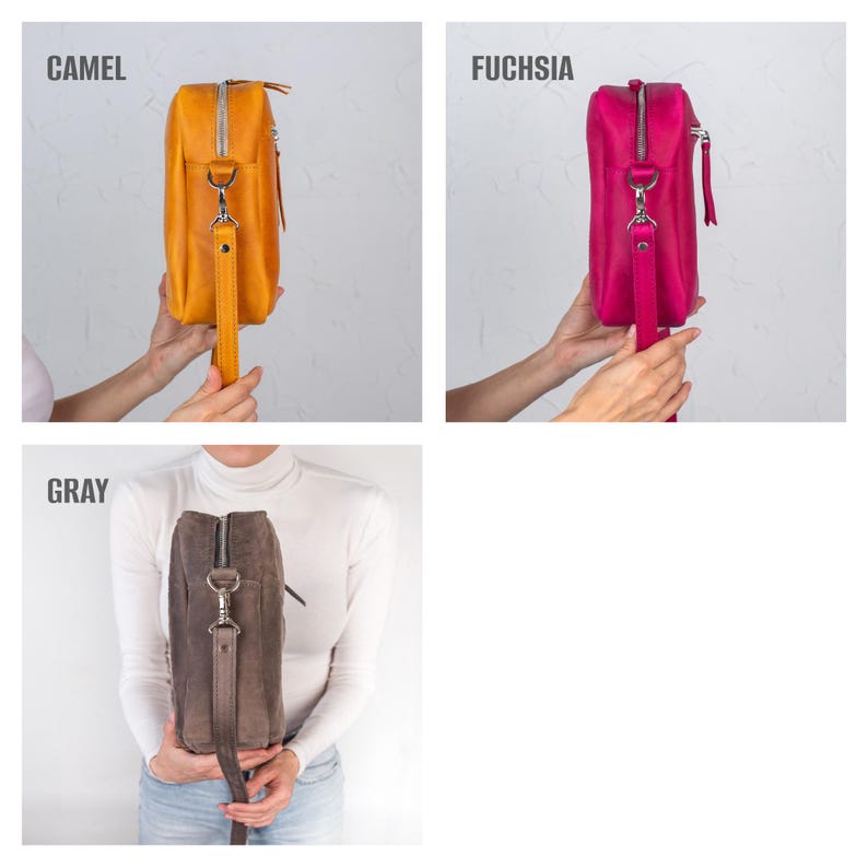 May include: A set of three leather crossbody bags in camel, fuchsia, and gray. Each bag has a rectangular shape, a zipper closure, and a long strap. The bags are displayed against a white background.