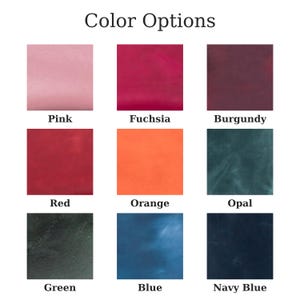 May include: A grid of nine square color swatches labeled Color Options. The colors are pink, fuchsia, burgundy, red, orange, opal, green, blue, and navy blue. Each swatch displays a distinct solid or marbled hue, providing a visual reference for available material color choices.