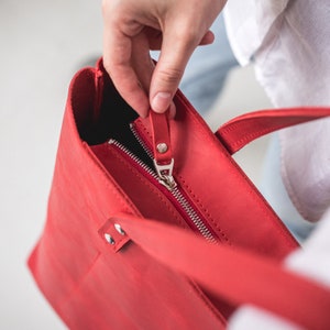 Red leather bag with zipper