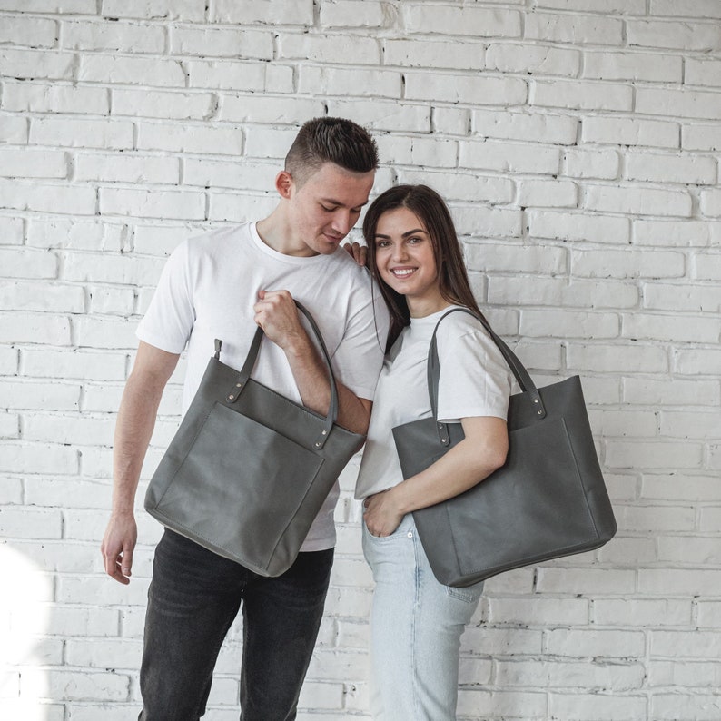 Gray leather tote bags