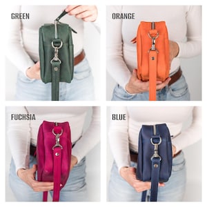 Pu&ograve; includere: Quattro borse a tracolla in pelle di diversi colori: verde, arancione, fucsia e blu. Ogni borsa ha una chiusura argentata e una lunga tracolla.
