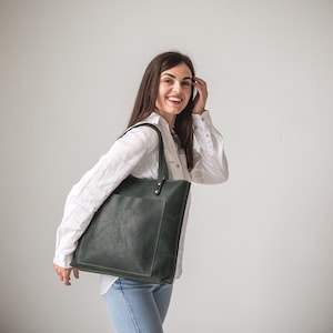 Green leather tote bag with outside pocket