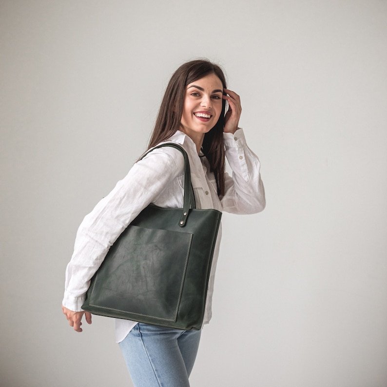 Green leather tote bag with outside pocket