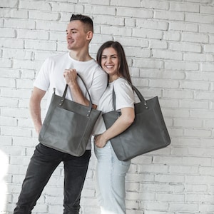 Gray leather shoulder bags