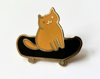 cat on skateboard enamel pin