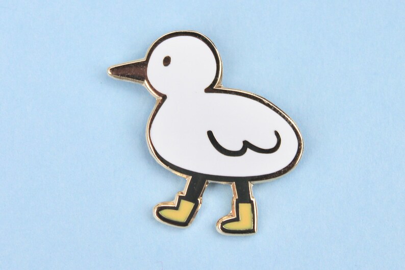 bird with boots enamel pin image 2