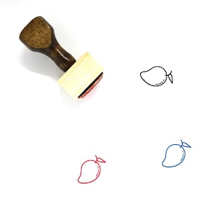 May include: A wooden rubber stamp with a mango design. The stamp is red and has a wooden handle. The mango is outlined in black and has a green leaf.