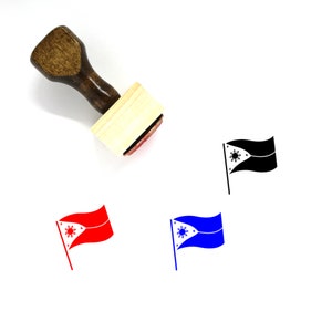 May include: A wooden rubber stamp with a red, white, and blue Philippine flag design. The stamp is on a white background.