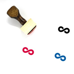 May include: A wooden stamp with a black, red, and blue infinity symbol. The stamp is on a white background.