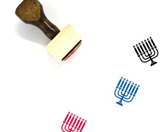 May include: Wooden stamp with a menorah design. The stamp is brown with a light wood base. The menorah is shown in three different colors: black, blue, and red.