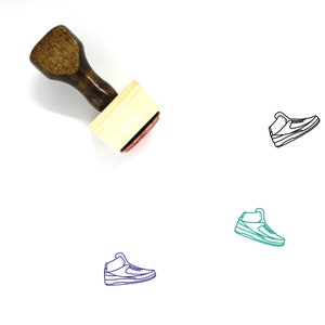 May include: A wooden rubber stamp with a high-top sneaker design. The stamp is brown with a red ink pad. The sneaker design is outlined in black.