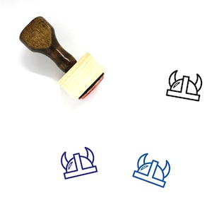 May include: Wooden rubber stamp with a handle and a rectangular base. The stamp features a line drawing of a Viking helmet with horns.