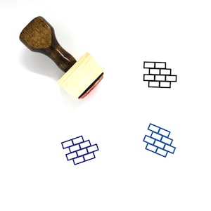 以下が含まれることがあります： ハンドルと長方形のベースが付いた木製ゴムスタンプ。スタンプにはレンガの壁の黒色の線画が描かれています。