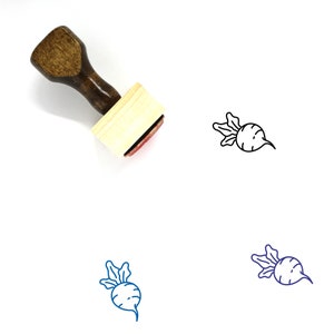 Könnte beinhalten: Holz-Stempel mit braunem Griff und rechteckigem Holzblock. Der Stempel zeigt eine Strichzeichnung einer Rübe.