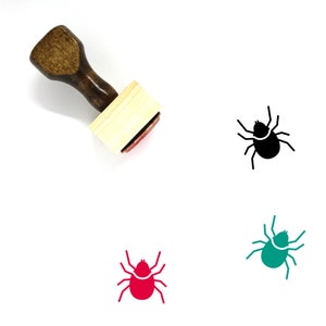 May include: A wooden rubber stamp with a black, red, and green tick icon. The stamp is used to mark items as checked or complete.