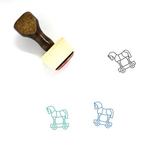 Puede incluir: Sello de goma de madera con mango marrón y base rectangular. El sello presenta un dibujo lineal del Caballo de Troya, un caballo de madera mítico utilizado en la Guerra de Troya.