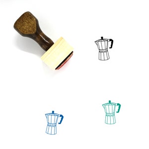 May include: A wooden rubber stamp with a red ink pad. The stamp features a black line drawing of a coffee pot.