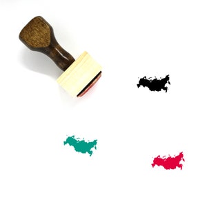May include: A wooden stamp with a red ink pad, featuring an outline of the country of Russia. The stamp is shown next to three different colored versions of the outline of Russia: black, green, and red.