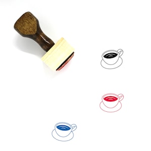 May include: A wooden rubber stamp with a brown handle and a rectangular wooden block. The stamp features a black outline of a coffee cup and saucer.