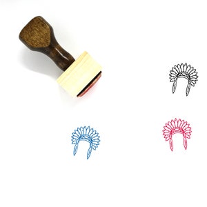 May include: Wooden rubber stamp with a brown handle and a rectangular wooden block. The stamp features a black line drawing of a Native American headdress with feathers.