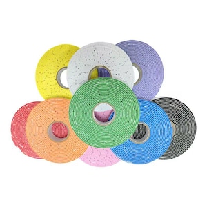May include: A collection of colorful foam tapes in various shades, including yellow, white, green, blue, and black. Each roll is circular with a central hole, and the foam has a textured appearance. The tapes are arranged in a visually appealing, overlapping pattern.