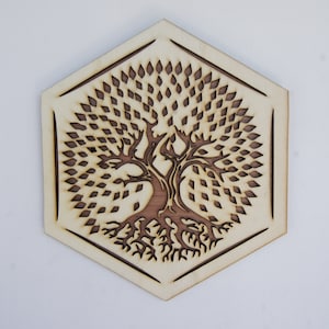Stylized wooden tree of life in a hexagon