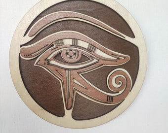 Oeil d’Horus en bois : un symbole de protection