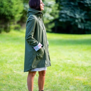 Olive green raincoat Waterproof Windproof Hooded Women's Coat with long sleeve and large pockets image 9