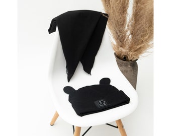 Black stylish hat for a child with a scarf