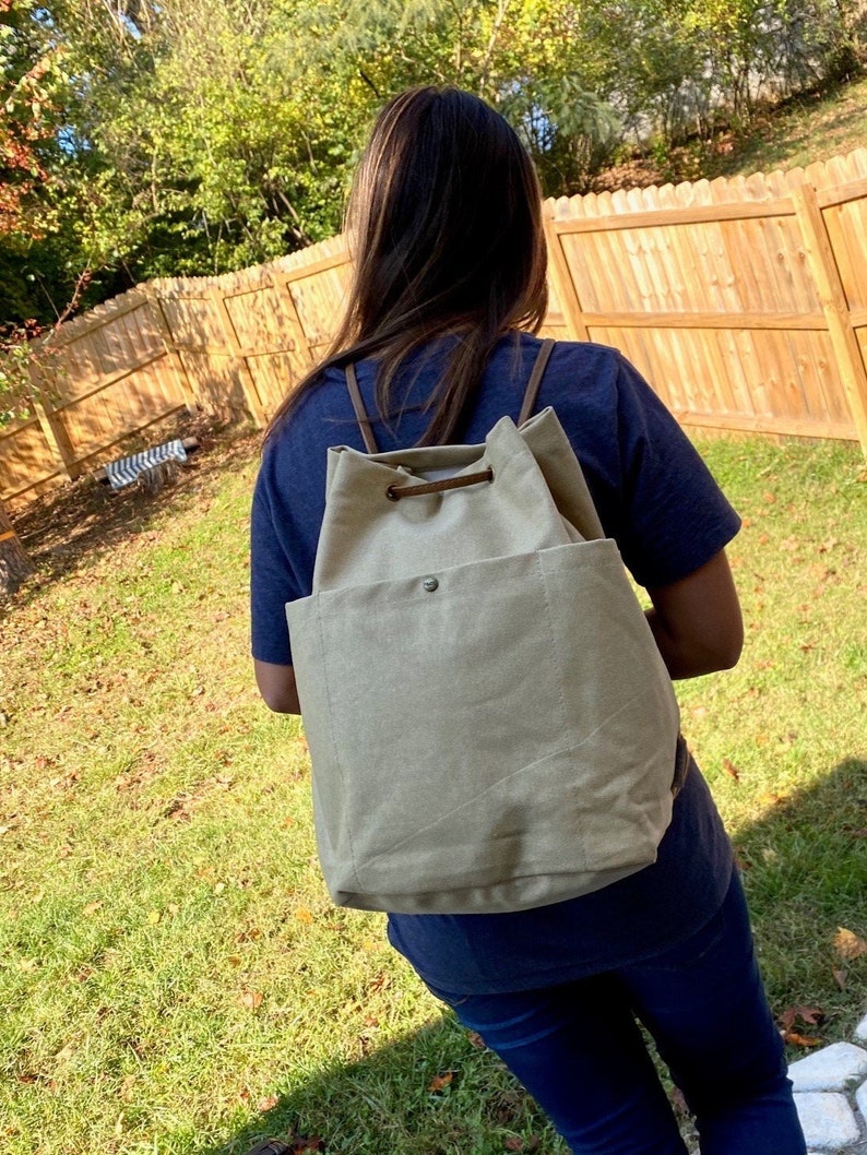 Custom Canvas Drawstring Backpack Keepers of the Lost Cities. Black Swan