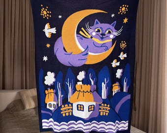 May include: A purple cat with a yellow bow sits on a yellow crescent moon against a dark blue background with white stars. The cat is surrounded by white birds and a small village with orange roofs.